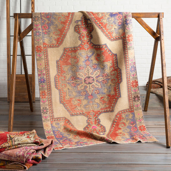 Antique Turkish hand-knotted rug in terracotta, 4'2" x 7'2", styled in a room