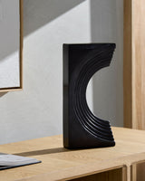 Trajan Decorative Sculpture AAJ-001 in Black, styled in a room