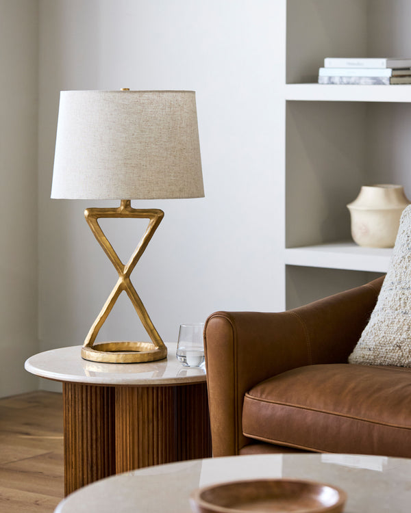 Adaje Accent Table Lamp in gold, styled in a room