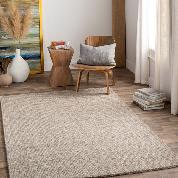 Aiden Hand Tufted Rug AEN-1005 in Grey, styled in a room