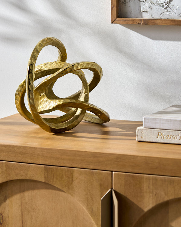 Zahira Decorative Sculpture AHZ-004 in Brass, styled in a room