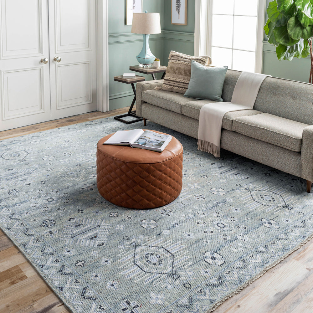 Almeria Hand Knotted Rug ALM-2302 in Denim, styled in a room