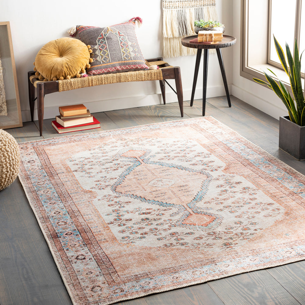 Amelie Machine Woven Rug AML-2326 in Pink, styled in a room