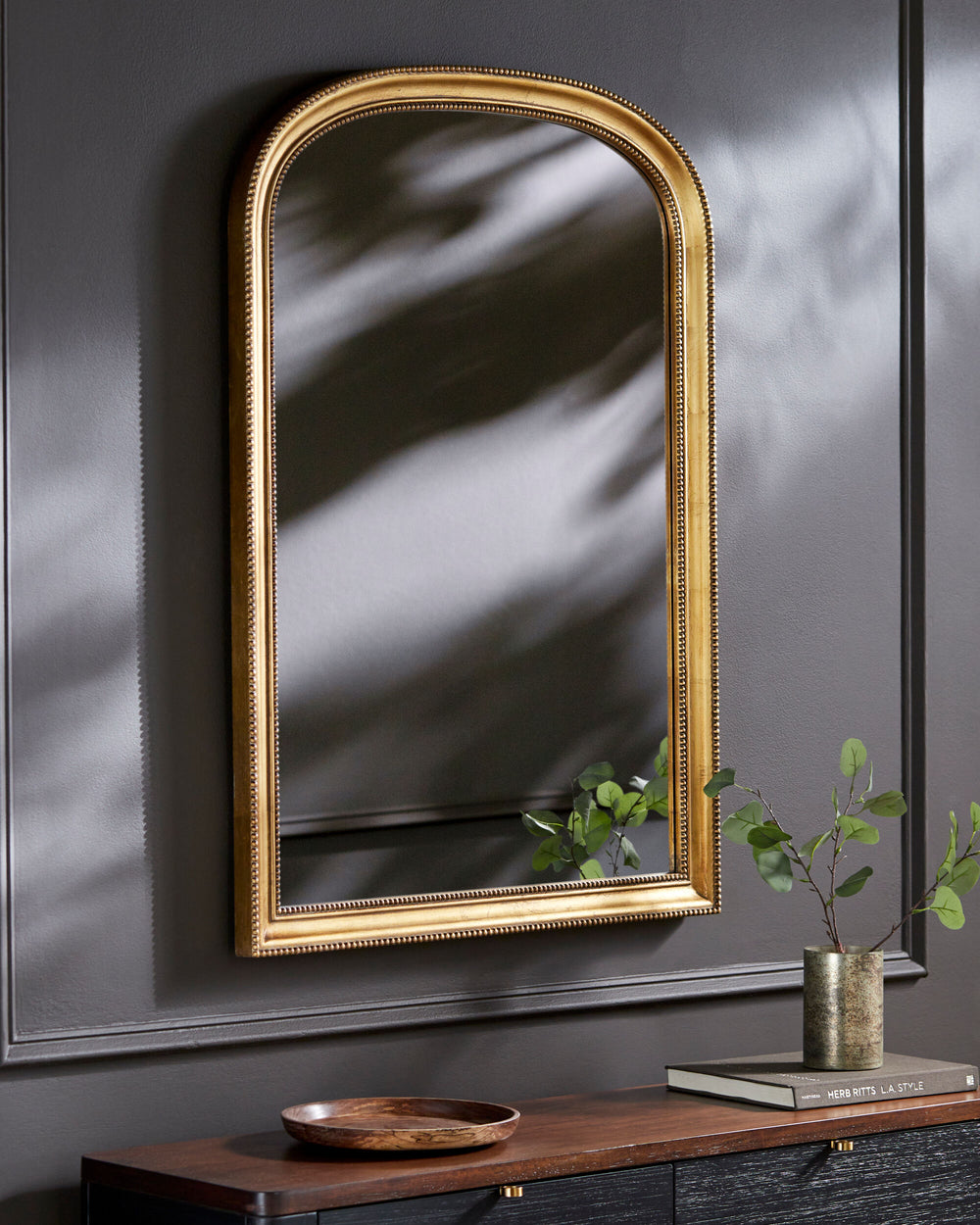 Nalanda Mantel Mirror ANAN-002 in Gold, styled in a room