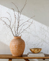 Artefact Vase ARC-001 in Terracotta, styled in a room