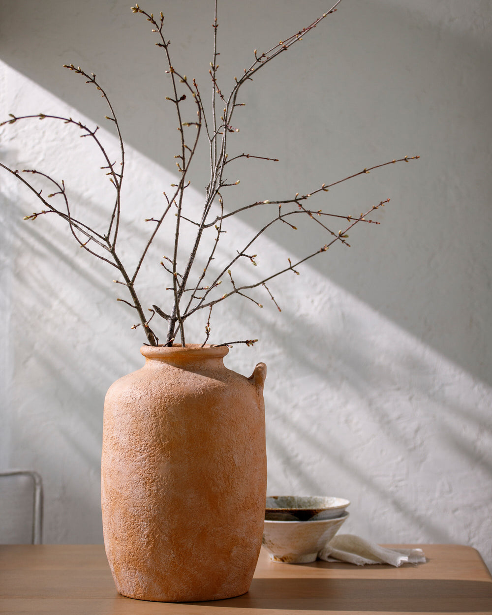Artefact Vase ARC-003 in Terracotta, styled in a room