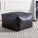 Barrington Pouf in black, styled in a room