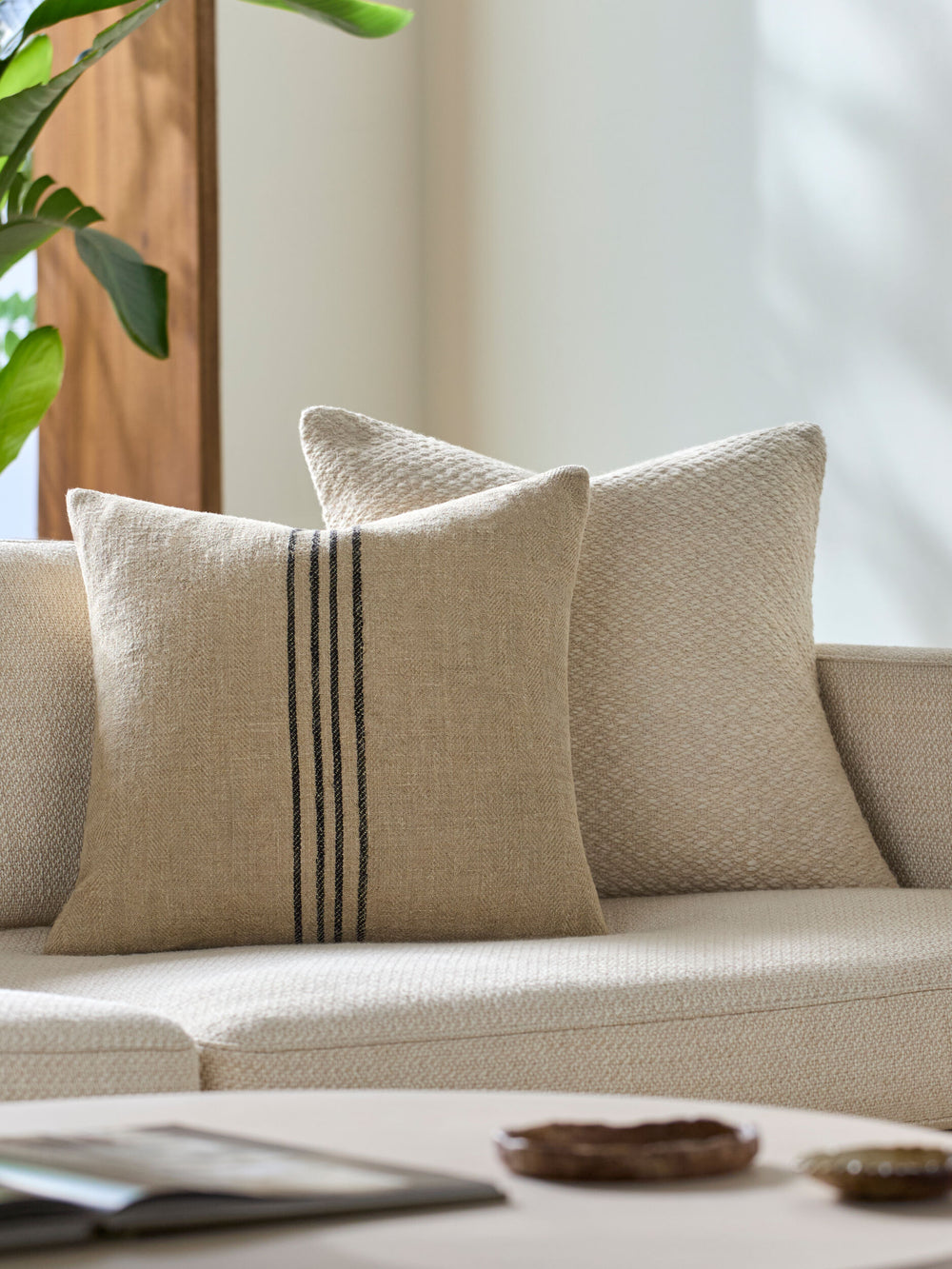Brett Accent Pillow BOBT-001 in Light Brown, styled in a room