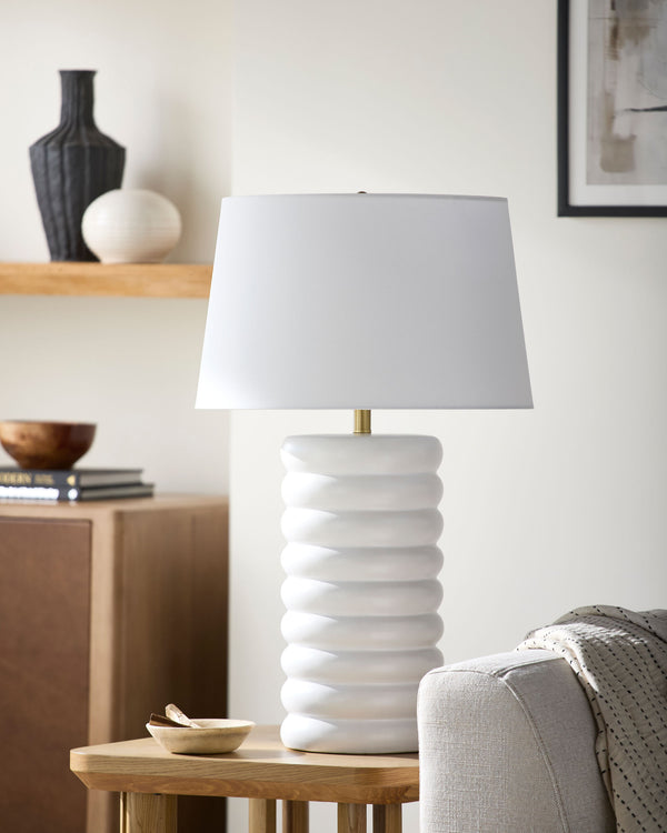 Brienza Accent Table Lamp in white, styled in a room
