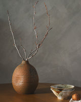 Chaoshan Vase CNH-001 in Terracotta, styled in a room