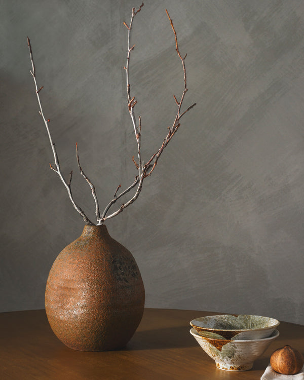 Chaoshan Vase CNH-001 in Terracotta, styled in a room