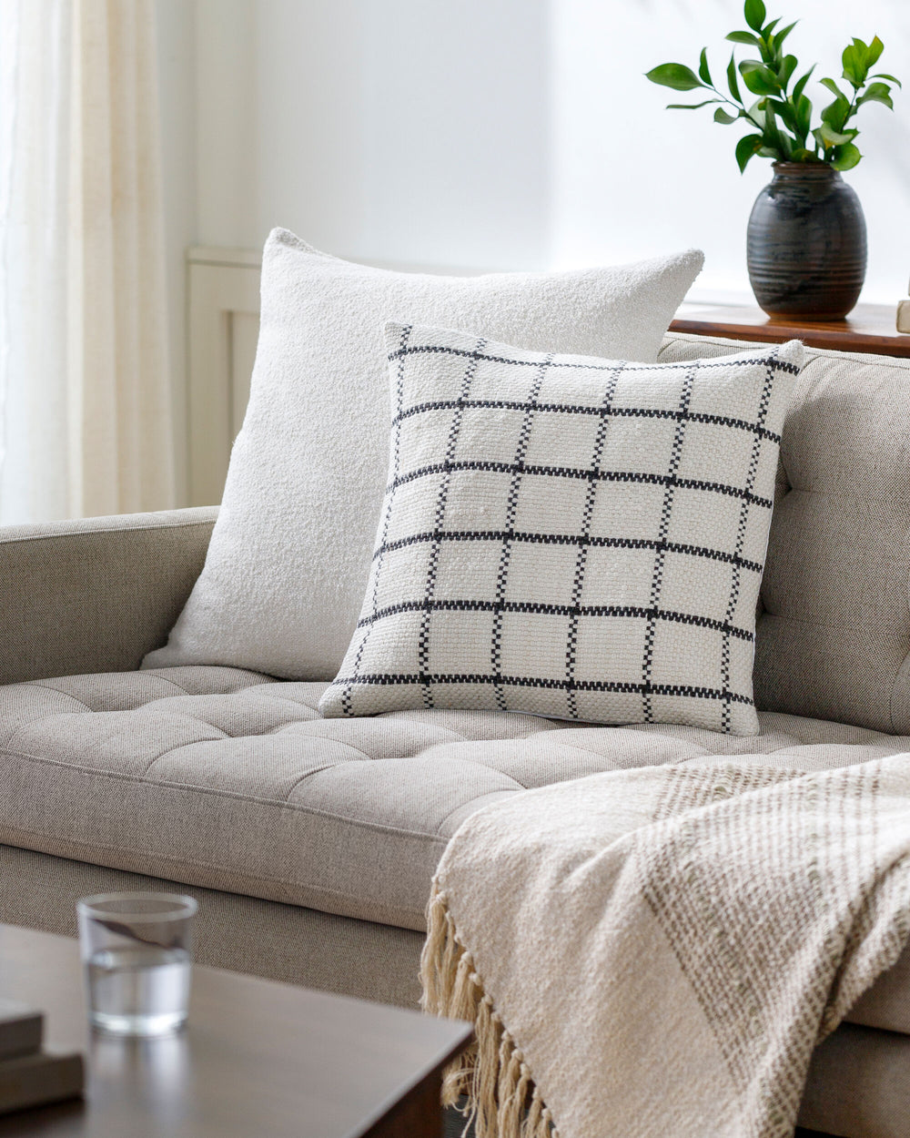 Charmaine Accent Pillow CRM-001 in Ivory, styled in a room