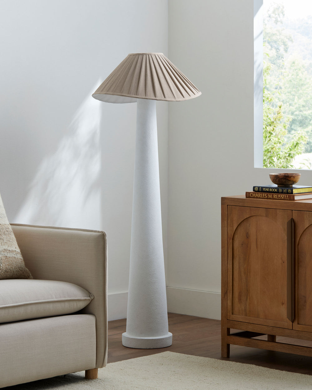 Docia Accent Floor Lamp, styled in a room