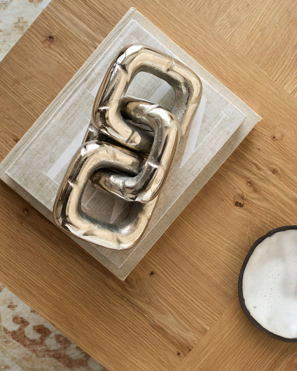 Sherman Decorative Sculpture EMH-001 in Silver, styled in a room