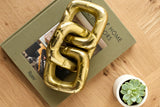 Sherman Decorative Sculpture EMH-002 in Brass, styled in a room