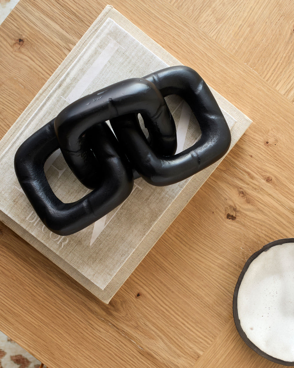 Sherman Decorative Sculpture EMH-003 in Black, styled in a room