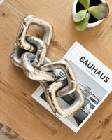 Sherman Decorative Sculpture EMH-004 in Silver, styled in a room