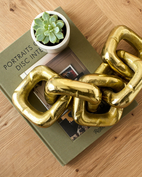 Sherman Decorative Sculpture EMH-005 in Brass, styled in a room