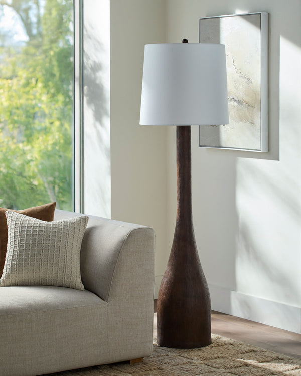 Fonce Accent Floor Lamp in dark brown, styled in a room
