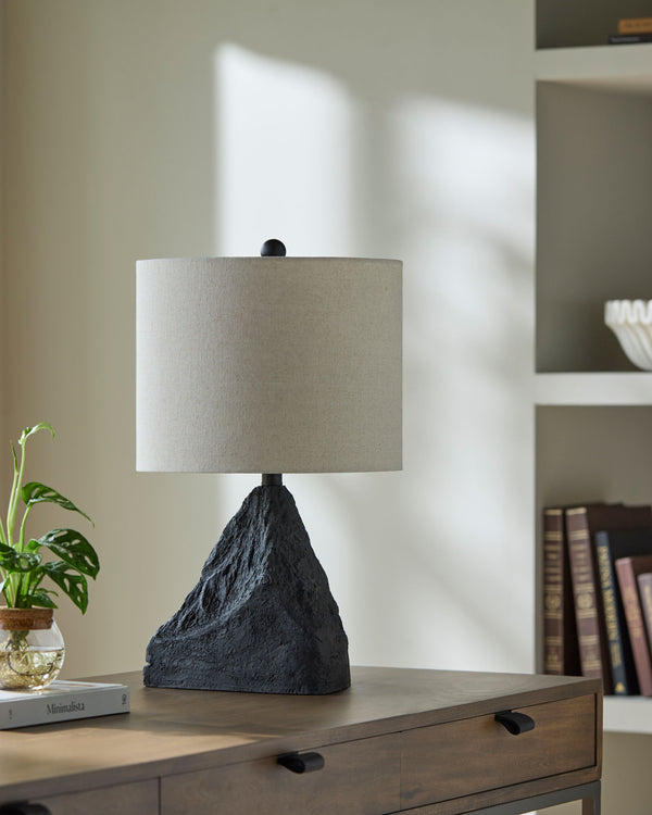 Fuego Accent Table Lamp in black, styled in a room