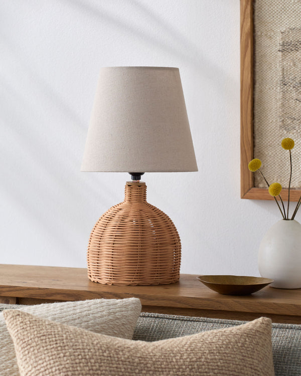 Grotta Accent Table Lamp in brown, styled in a room