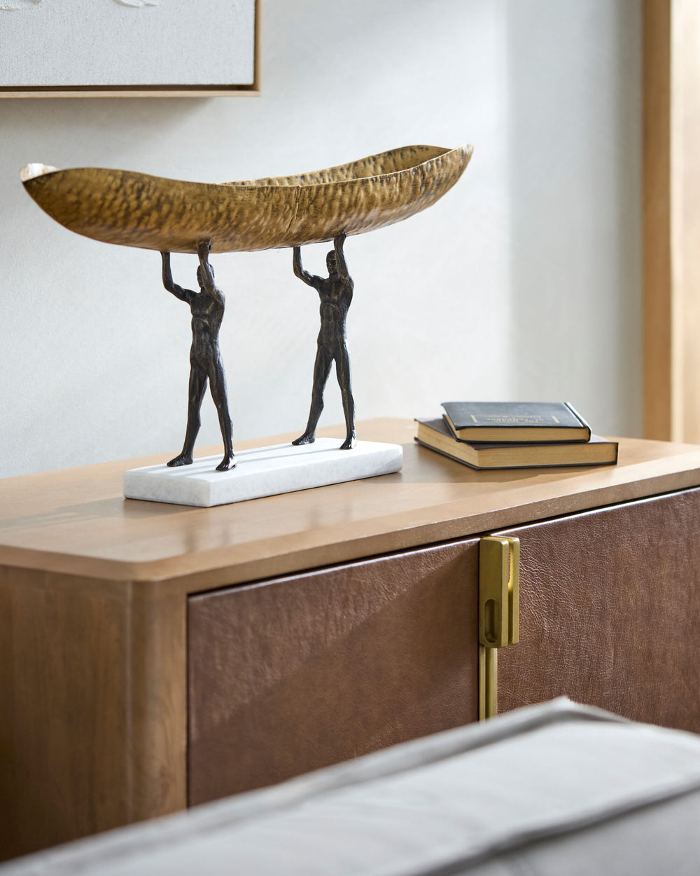 Homo Sapiens Decorative Bowl HOS-001 in Gold, styled in a room