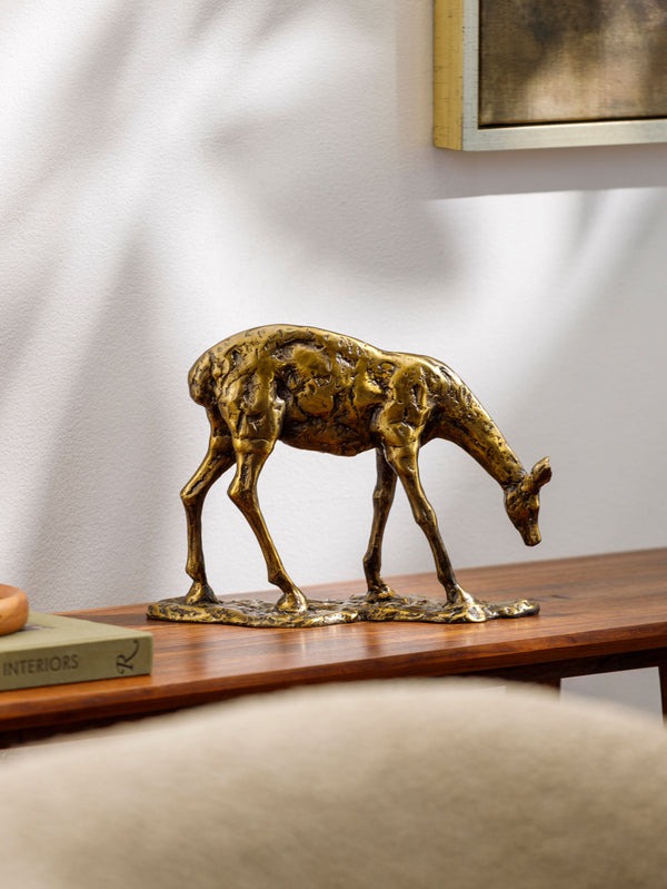 Marins Decorative Sculpture IRM-004 in Gold, styled in a room