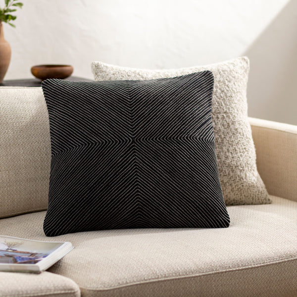 Kohl Accent Pillow KOH-001 in Charcoal, styled in a room