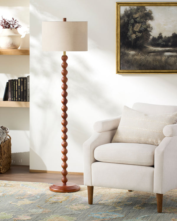 Lubao Accent Floor Lamp in dark brown, styled in a room