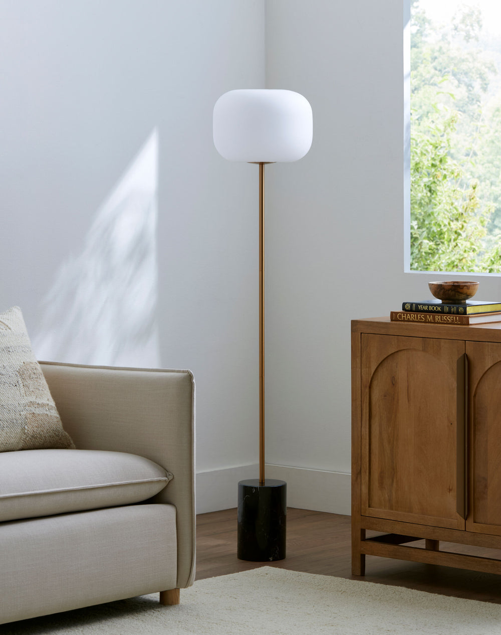Lunaris Accent Floor Lamp, styled in a room