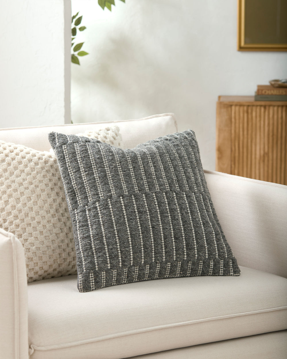 Monacizzo Accent Pillow MCZ-003 in Charcoal, styled in a room