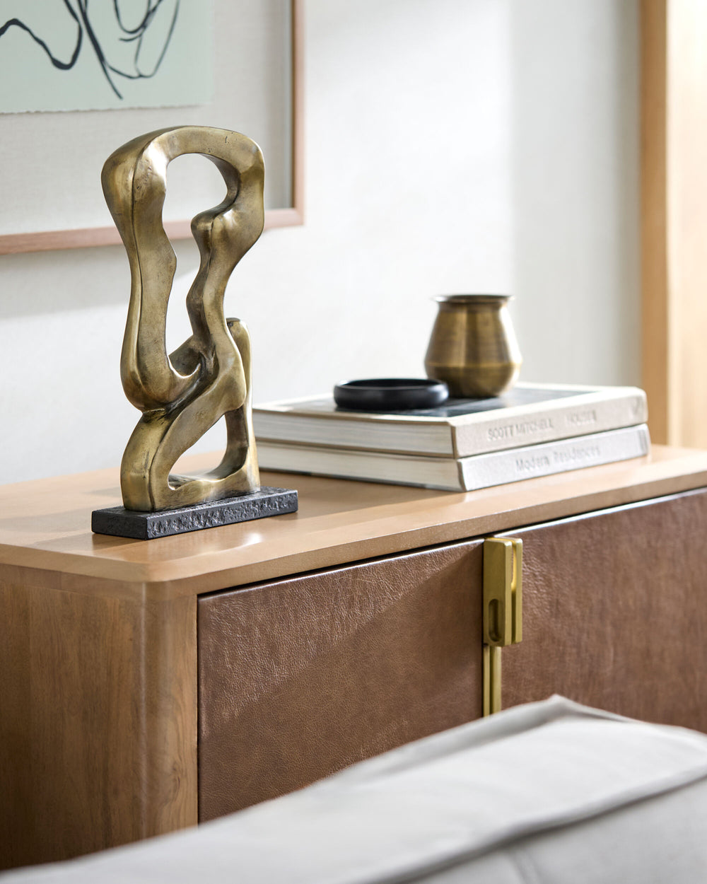 Neblina Decorative Sculpture NEN-001 in Gold, styled in a room