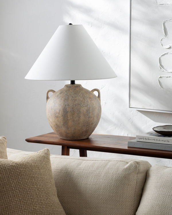 Nivalis Accent Table Lamp in grey, styled in a room