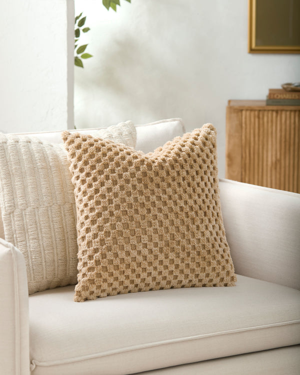 Novoli Accent Pillow NVO-001 in Taupe, styled in a room