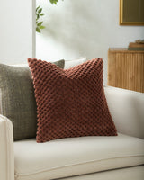 Novoli Accent Pillow NVO-003 in Chocolate, styled in a room