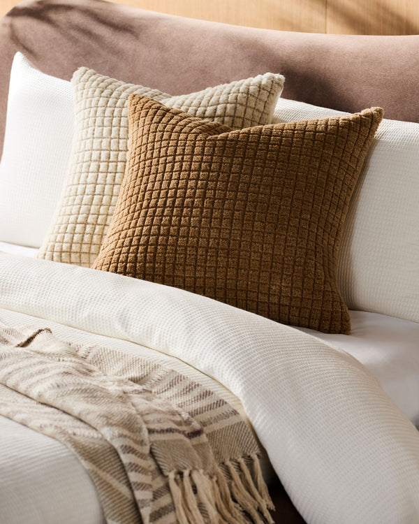 Novoli Accent Pillow NVO-005 in Caramel, styled in a room