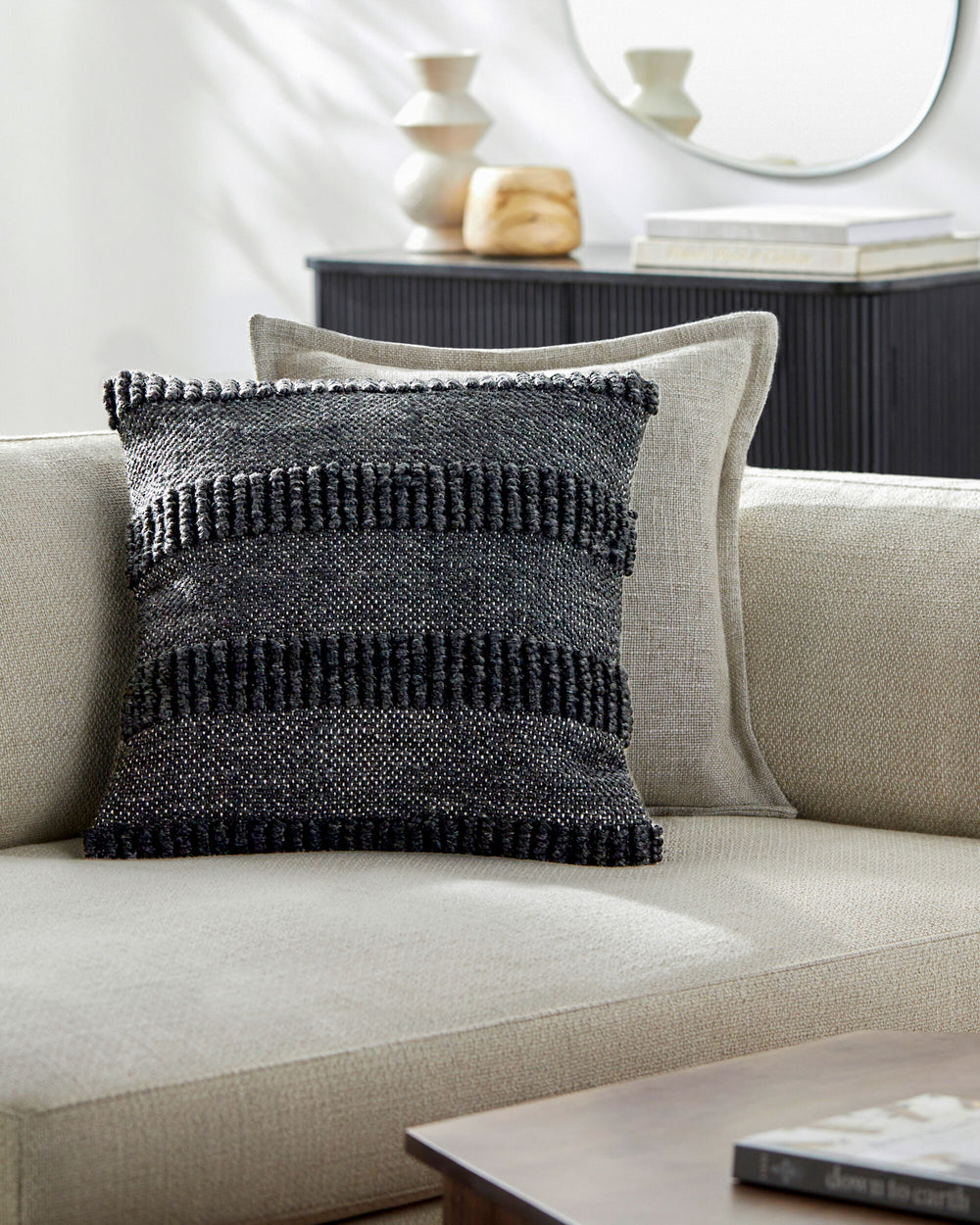 Nysa Accent Pillow NYS-004 in Charcoal, styled in a room