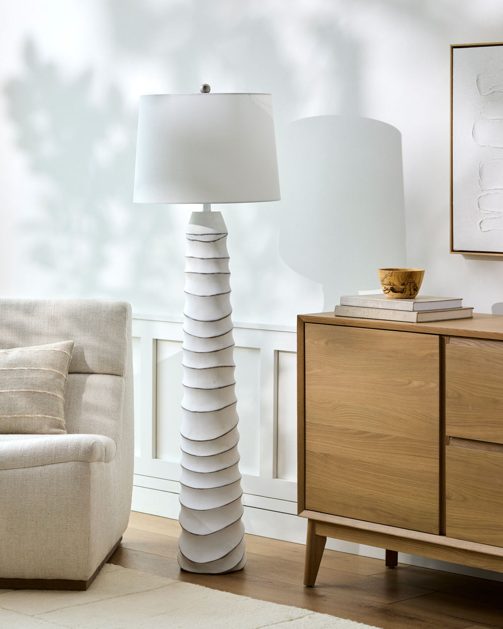 Obelisco Accent Floor Lamp, styled in a room