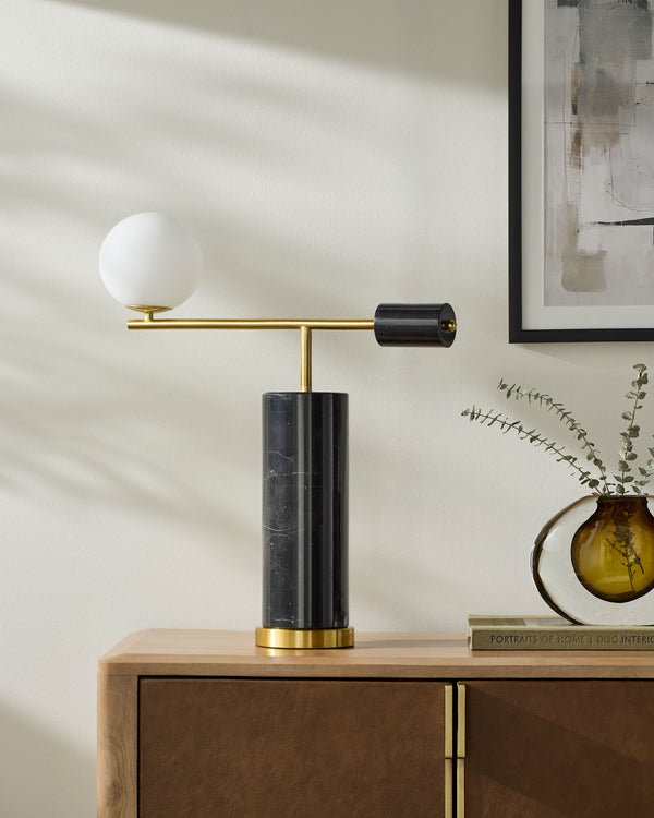 Oslin Accent Table Lamp in black, styled in a room