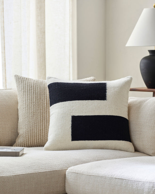 Osmund Accent Pillow OSM-001 in Black, styled in a room