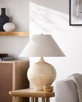 Pomarico Accent Table Lamp in wheat, styled in a room