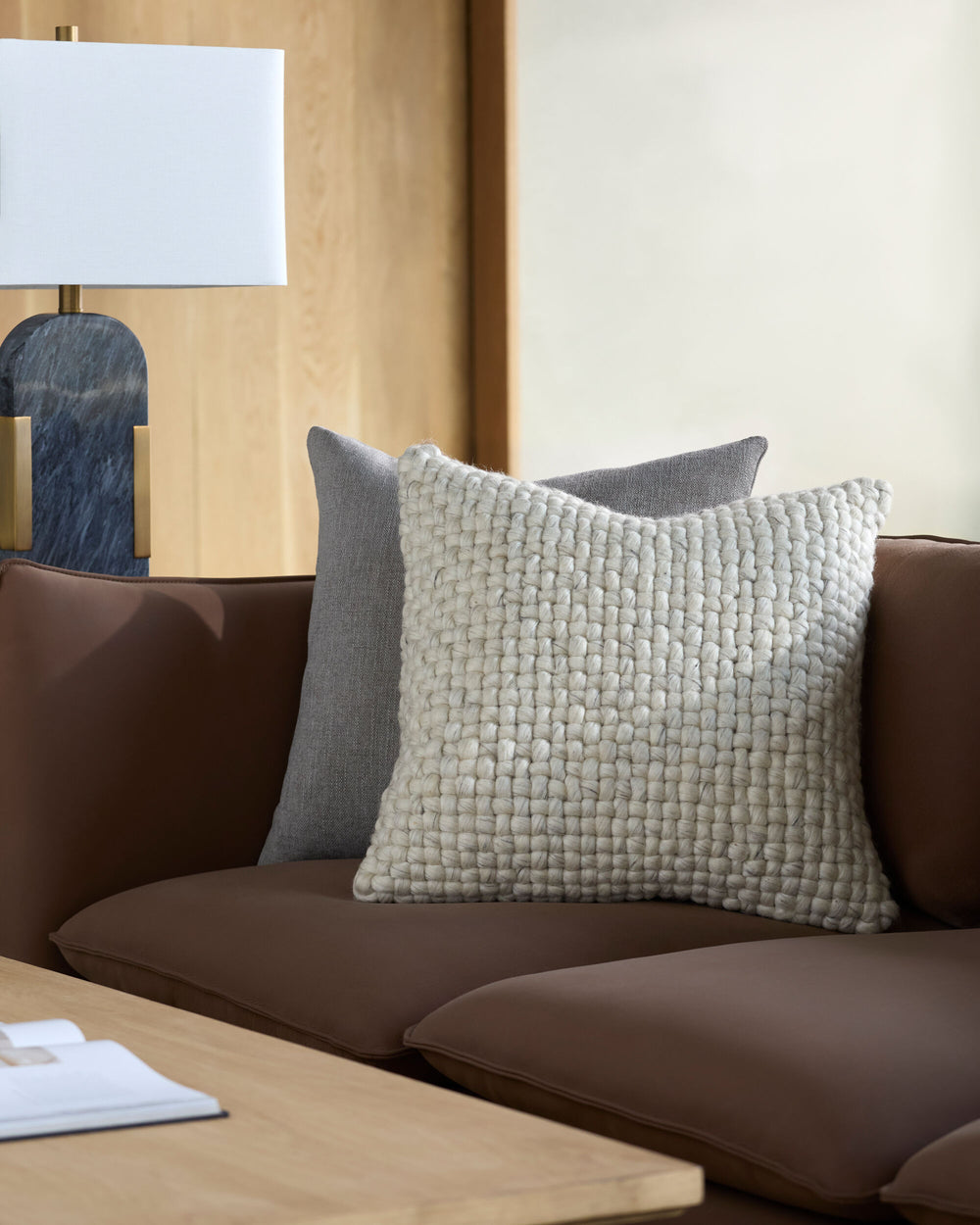 Pansy Accent Pillow PNY-002 in Taupe, styled in a room