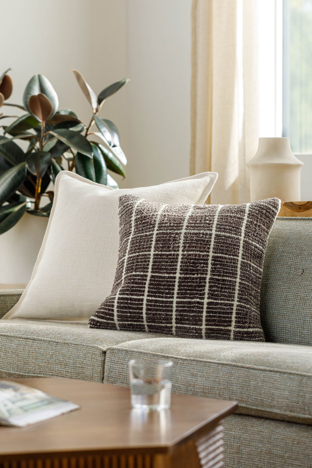 Rowley Accent Pillow ROW-004 in Charcoal, styled in a room