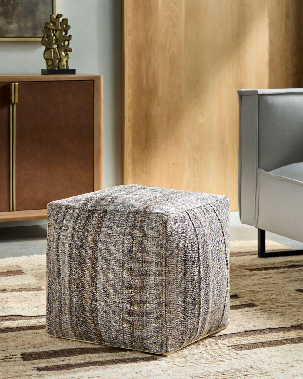 Mudcloth Pouf UDPF-001 in Dark Brown, styled in a room