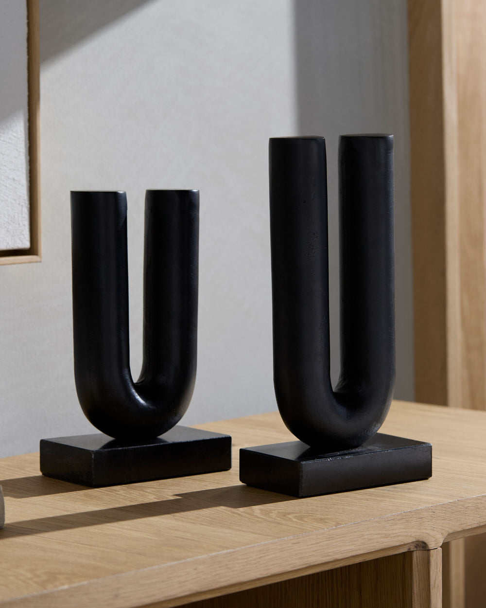 Layana Decorative Sculpture YNL-001 in Black, styled in a room