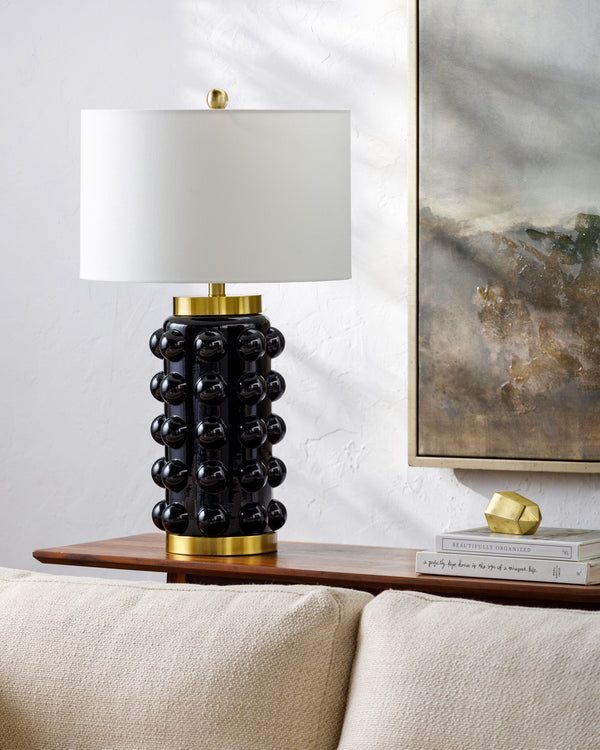 Yume Accent Table Lamp in black, styled in a room